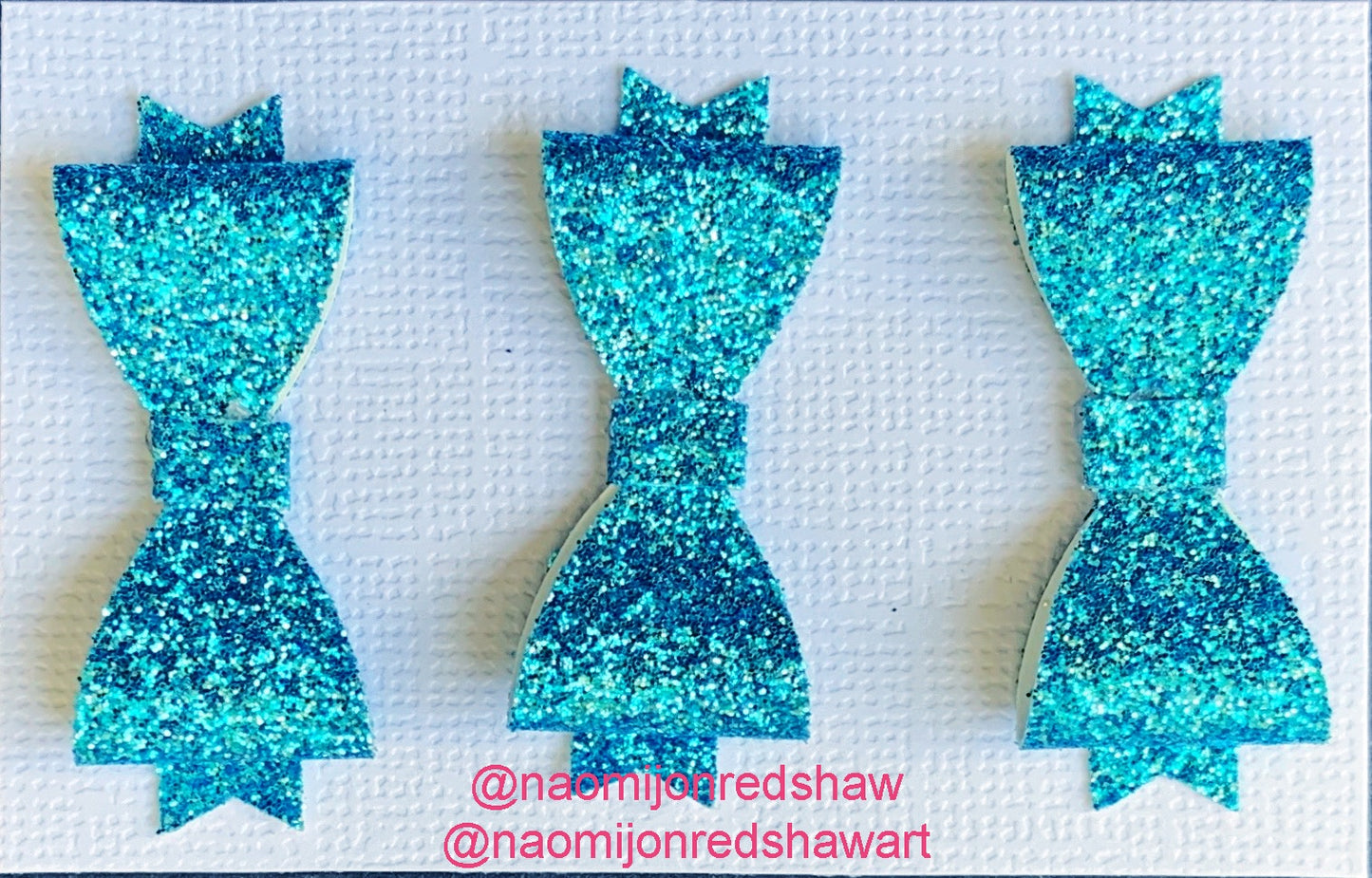 Handmade Mid Blue Sparkly Mini Glitter Bows (3 pack) by Naomi-Jon Redshaw