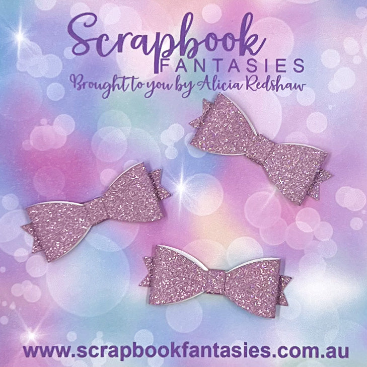 Handmade Dusty Lilac Fine Glitter Mini Bows (3 pack) by Naomi-Jon Redshaw