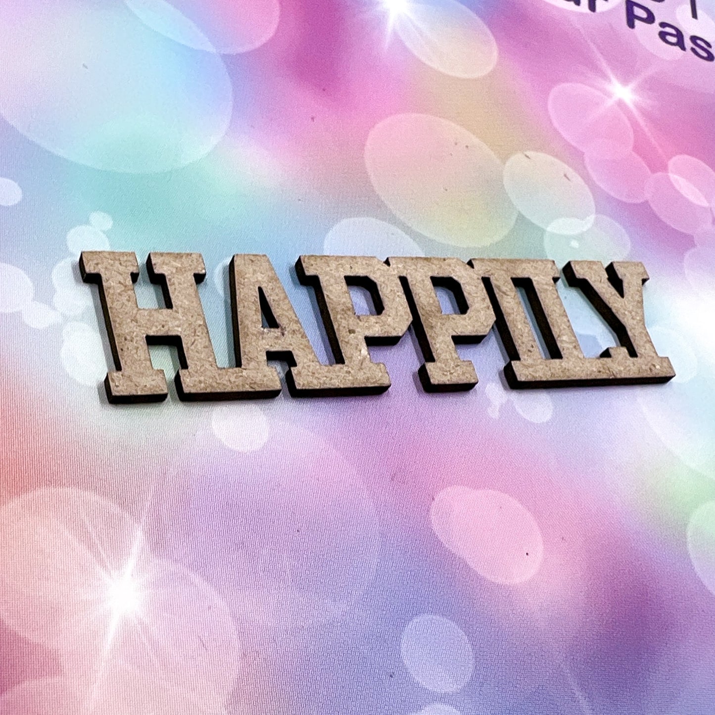 Chippie-Cuts Grey 1.2mm Chipboard Mini-Block Word - Happily 2.25"x0.5" 15388